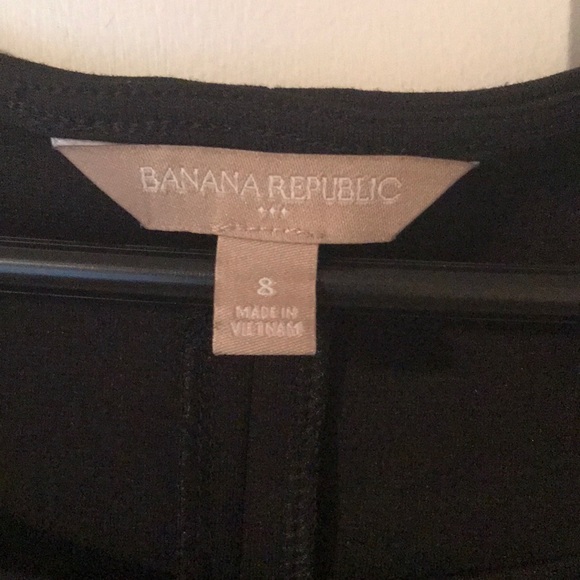 Short black dress with leather at the bottom - Picture 4 of 4